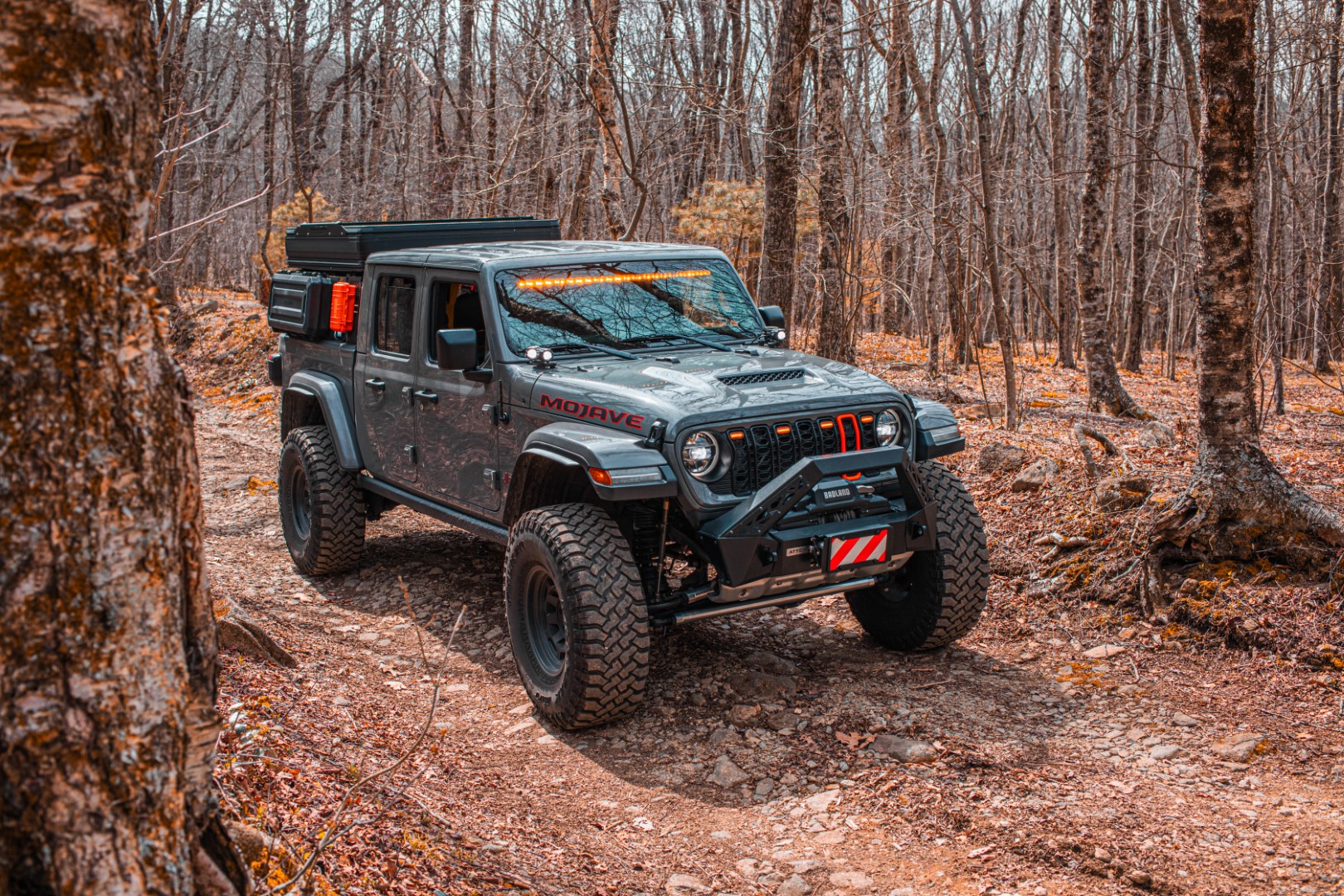 Jeep Gladiator Mojave on a wooded trail